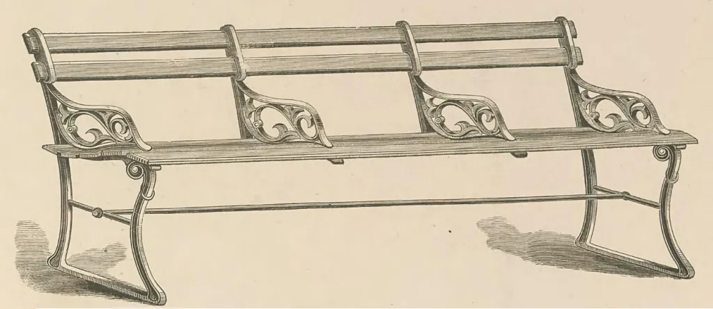 Vintage line engraving of a three-seat garden bench featuring ornate cast-iron side frames and back supports with scrolling decoration, combined with wooden slats for the seat and backrest in a classic Victorian design.