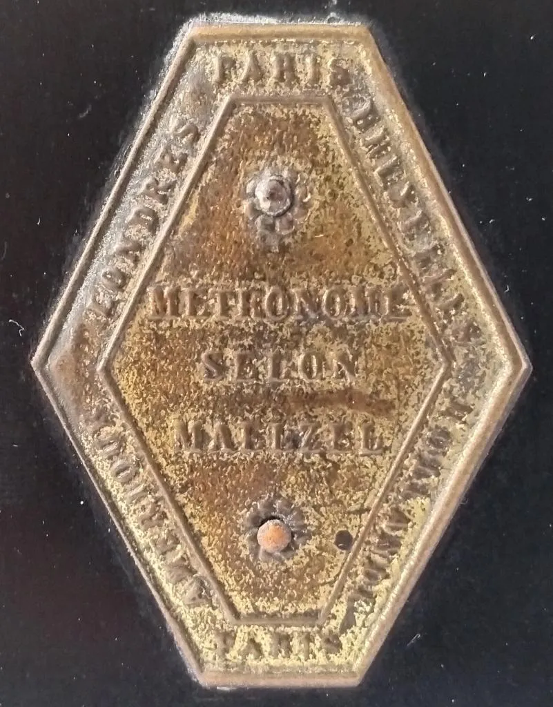 Brass maker's plaque from a Maelzel Selon Metronome (1846).