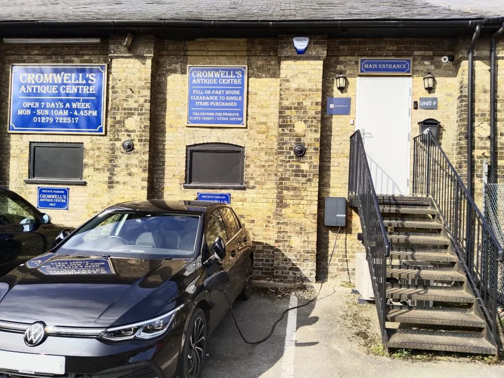 Main entrance of Cromwell’s Antique Centre with private parking spaces directly in front.