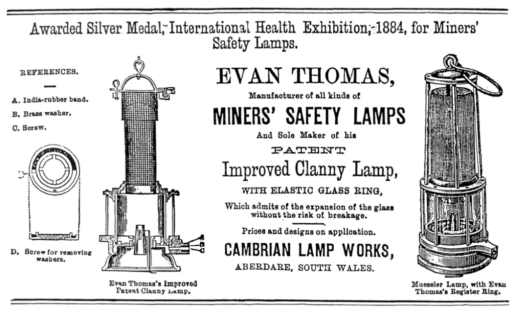 1886 advertisement by Evan Thomas, featuring the Improved Patent Clanny Lamp with elastic glass ring, manufactured at Cambrian Lamp Works, Aberdare. Includes labeled diagram and promotional text about safety, design, and awards.