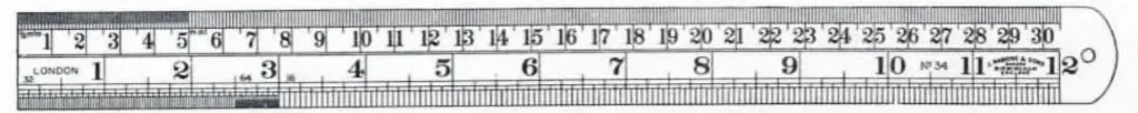 Nahaufnahme eines John Rabone & Sons Stahlmaßstabs, Nr. 34, in 6-Zoll- und 12-Zoll-Längen. Der Maßstab ist maschinenteilig und an zwei Kanten markiert mit Zollteilungen (1/16, 1/32, 1/64) sowie Millimetern und halben Millimetern.