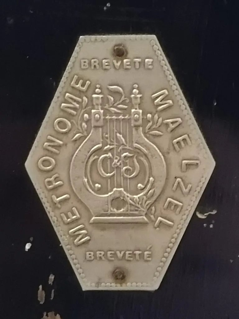 Maker's plaque from a Maelzel Metronome (1803).