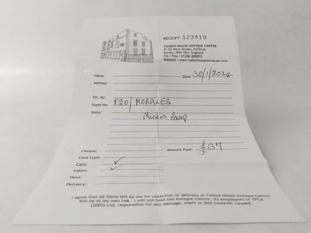 Receipt from Talbot House Antique Center in Dorking for the purchase of a miner’s lamp, showing a total of £37 paid in cash.