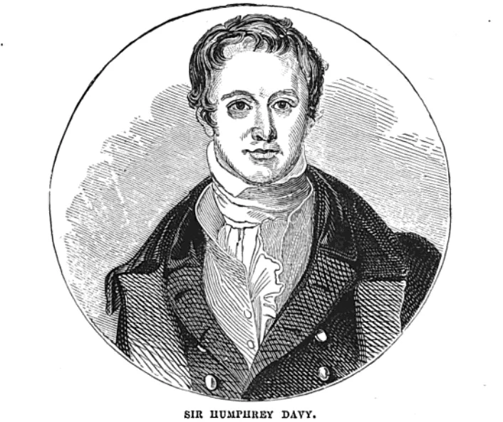 Schwarz-weißes graviertes Porträt von Sir Humphry Davy in Kleidung des 19. Jahrhunderts, dargestellt in einem runden Rahmen.