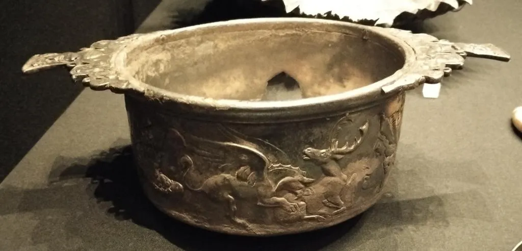 Roman silver skyphos with animal combat relief, 2nd century AD, partially gilded, exhibited at the Kunsthistorisches Museum Vienna.