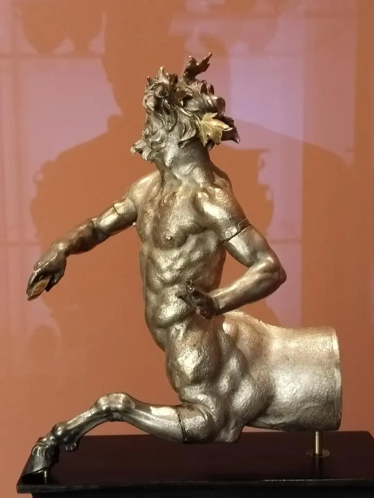 Fragment of a silver rhyton showing a centaur figure, made around 160 BC in Hellenistic Italy (Falerii), with detailed repoussé work and gilded elements.