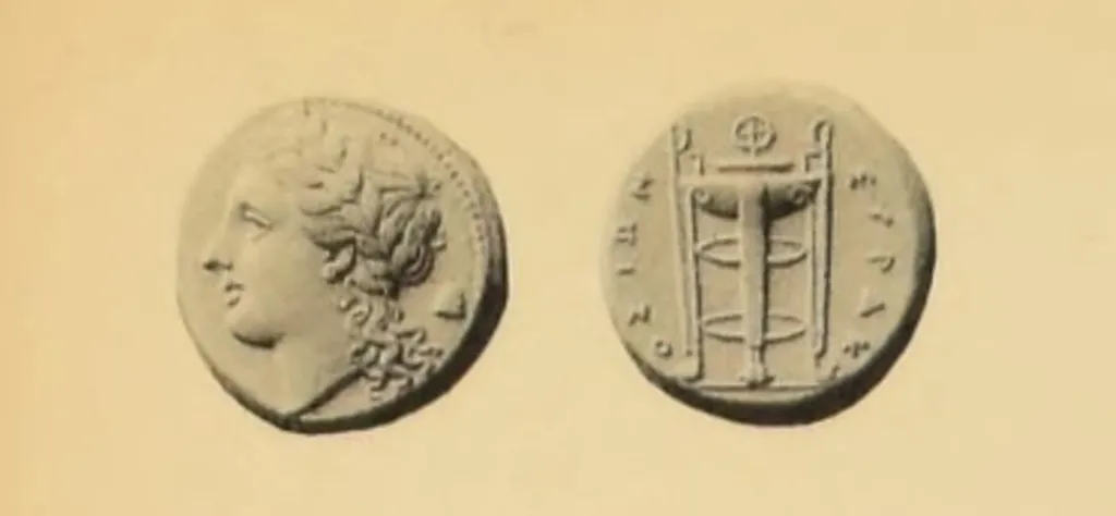 Electrum hemistater from Syracuse, Sicily, showing the laureate head of Apollo and a tripod lebes with the inscription SYRAKOSION.