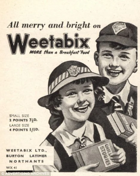 A vintage Weetabix advertisement featuring cheerful children in school uniforms, promoting the cereal as 