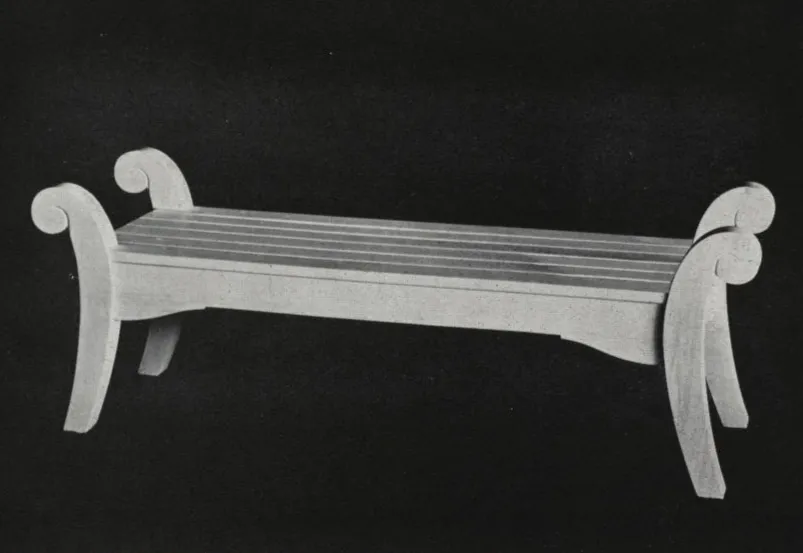 Black-and-white catalog photograph of a backless wooden garden bench featuring a slatted seat, gracefully curved scroll-shaped end supports, and a clean, symmetrical design inspired by classical garden furniture.