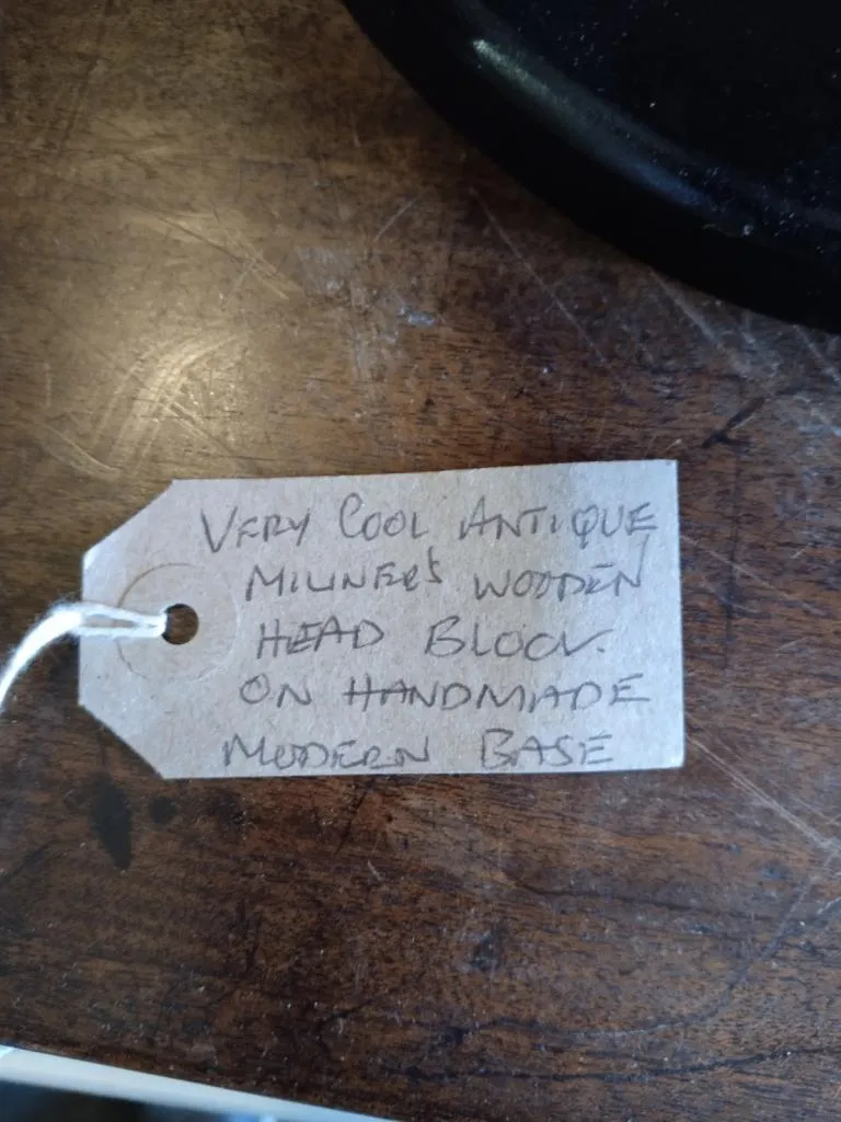 Very cool antique milliner wooden head block on a handmade modern base.